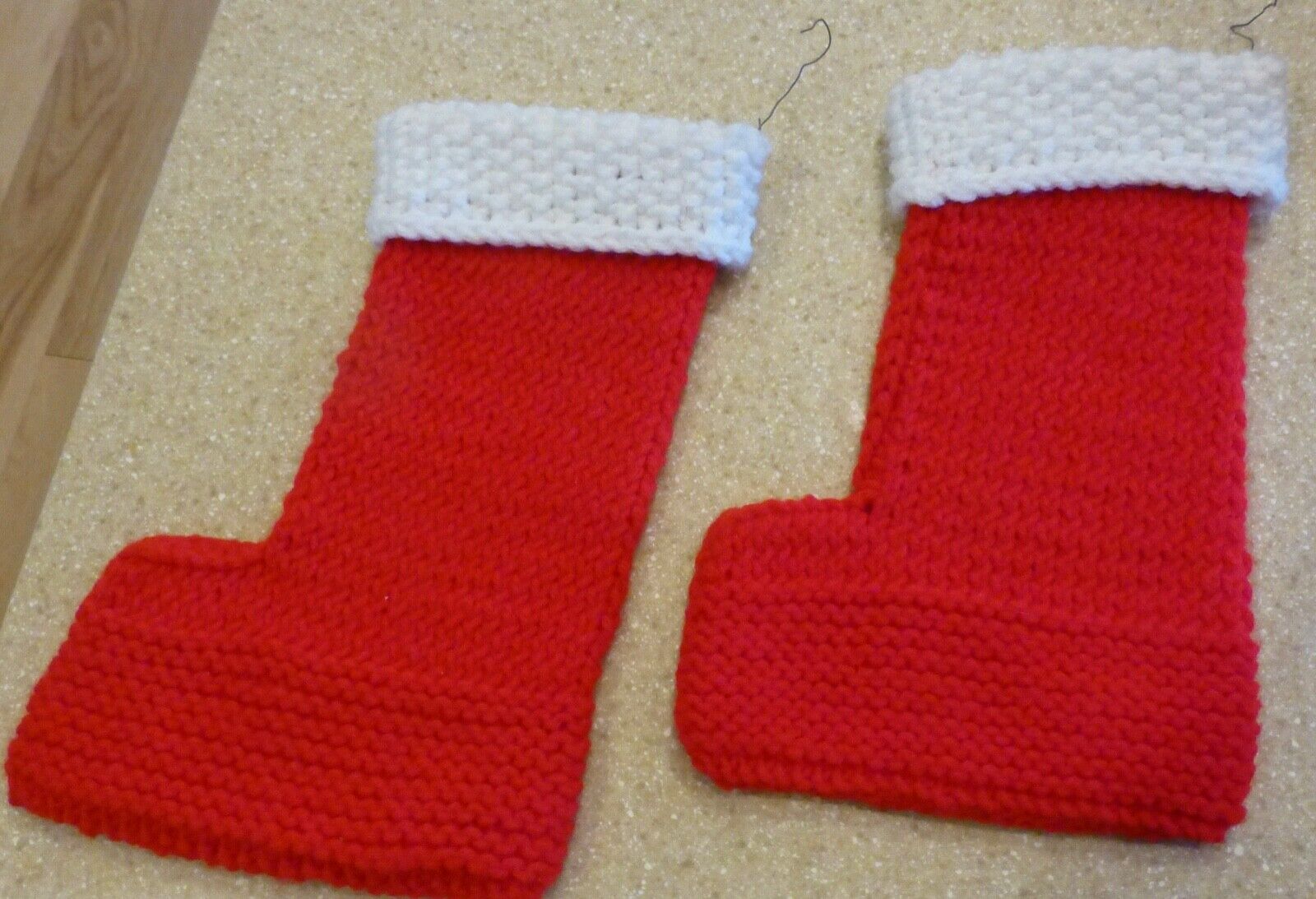 Pair Of Red And White Hand Knit Christmas Stockings